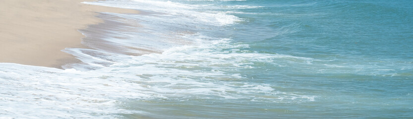 Fototapeta premium Sea waves blow on the sandy beach. for background