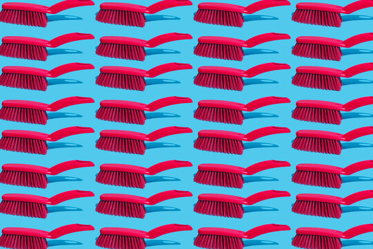 mosaic of pinkish red hand brushes