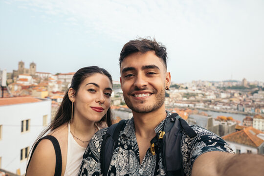 Selfie of a couple sightseeing in the city