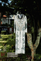 The white wedding dress is a classic and timeless choice, representing the bride's beauty and grace on her special day.