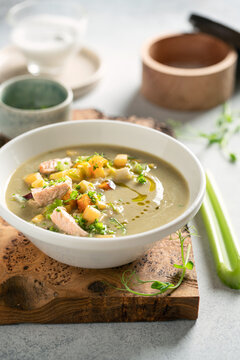 Healthy aip cream soup with salmon and vegetables
