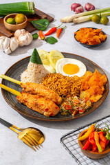 sate lilit is a satay variant in Indonesia, originating from Balinese cuisine. This satay is made from minced chicken and spiced minced meat is wound around lemongrass sticks then grilled on charcoal