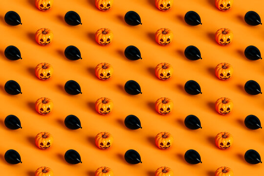 isometric pattern of Halloween pumpkin and black balloon