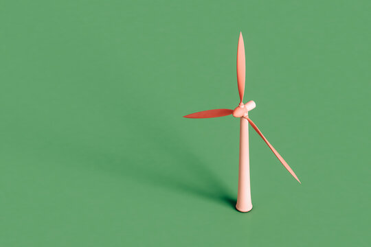 a pink wind turbine. renewable energy concept
