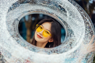 Happy girl with sparkling ring