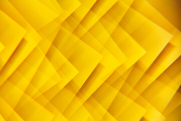 Yellow abstract colorful geometric lines made of paper