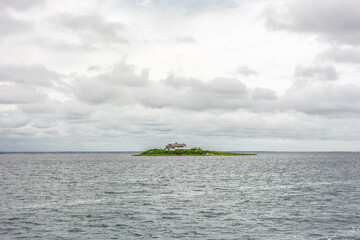 Lonely house on the tiny island