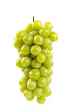 bunch of fresh green Shine Muscat grape isolated on white background