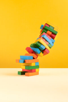 The falling pile of wooden blocks