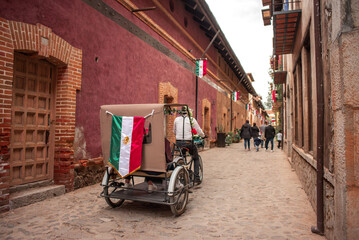 Valquirico, Tlaxcala, Mexico, 09 17 22, 
Tourist cart runs along the street of Valquirico during...