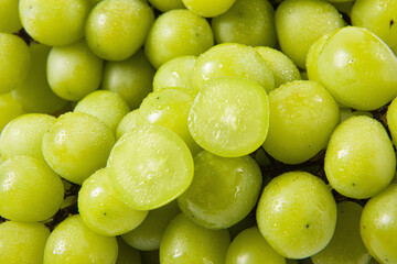 closeup of seedless green Shine Muscat grape background
