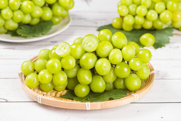  fresh green Shine Muscat grape on wooden table
