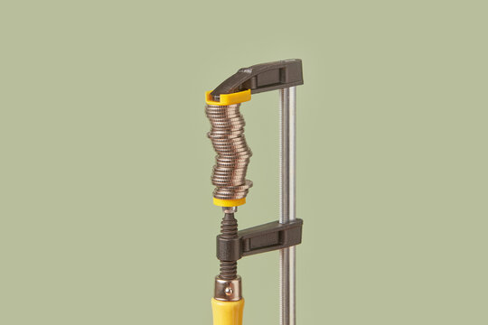 Stack of cents being measured by vernier caliper.