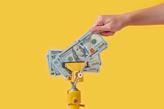 Dollars pulled by hand from clamp tool.