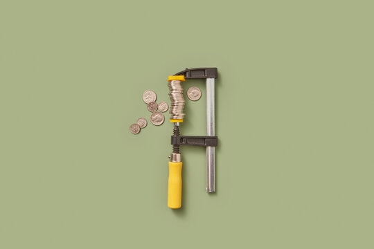 Cent coins being measured by vernier caliper.