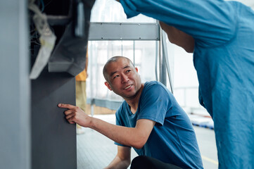 Asian workers in printing industry