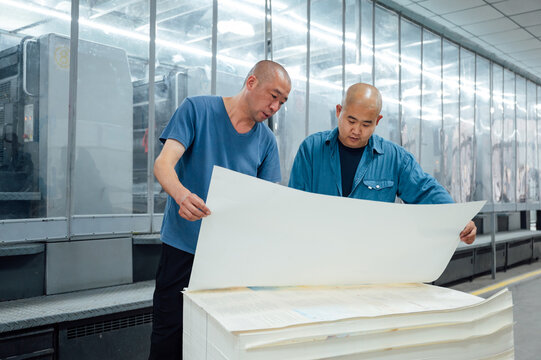 Asian workers in printing industry