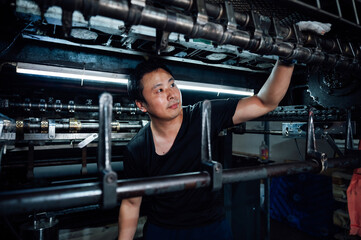 Asian worker in factory