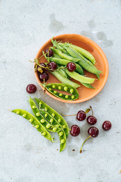 Green peas and cherries.
