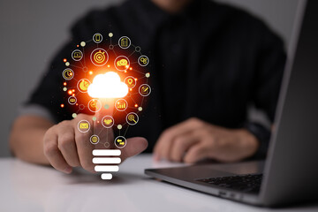 A unique light bulb with an application icon. business software and social media concepts. Business social media marketing and digital online marketing with cloud.