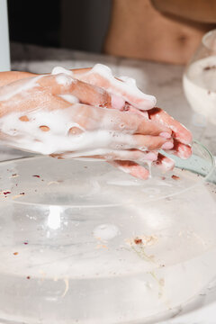 Woman Washing Hands With Foaming Soap 