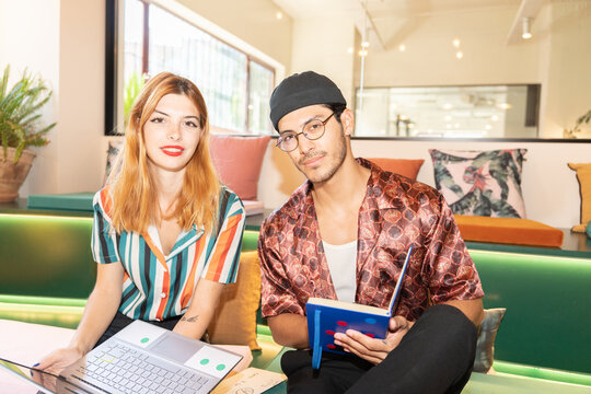 Two Colleagues With Direct Flash Photo In The Office.