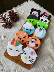 Varian cookies character on wooden plate