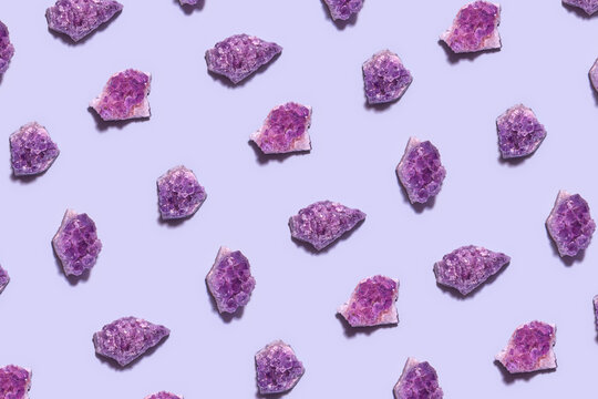Violet amethyst crystals as seamless background