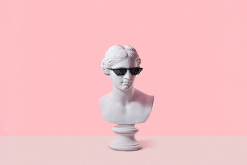 Venus gypsum bust in pixel glasses.