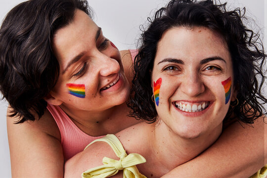 Portrait of Happy Couple With Rainbow Make-Up