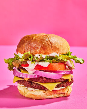 Beef Burger On Hot Pink Background