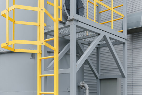 Close-up of a part of a factory-installed machine.