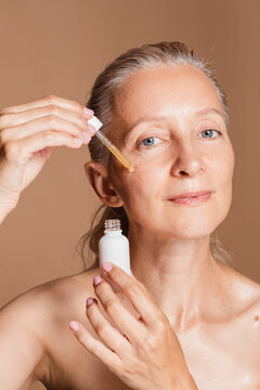 Middle age woman using hyaluronic acid