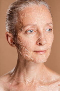 Textured cream on woman's face