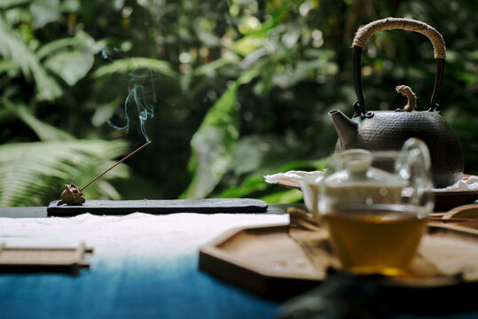 Steaming aroma stick on a tea table