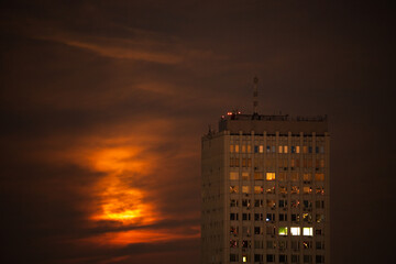 Fiery Glowing Moon Sky In City