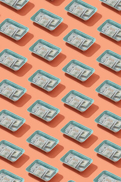 Dollars in disposable boxes pattern.