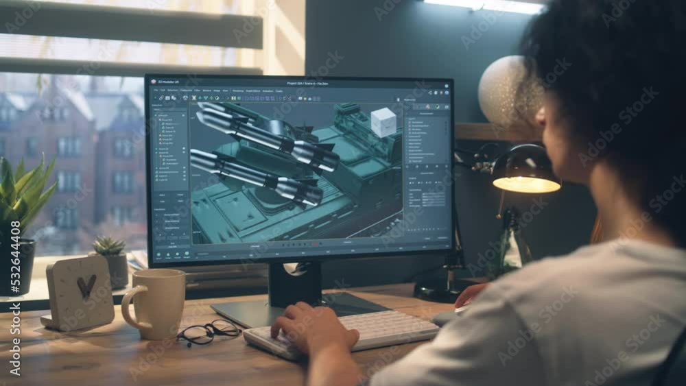 Poster male designer creating 3d model of missile launcher using professional 3d modeling program on comput