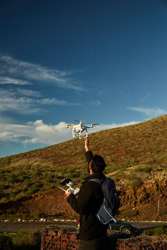 Drone pilot catching drone