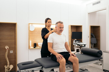 Physiotherapist in a rehabilitation clinic