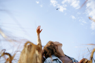 lesbian couple in wheat field
