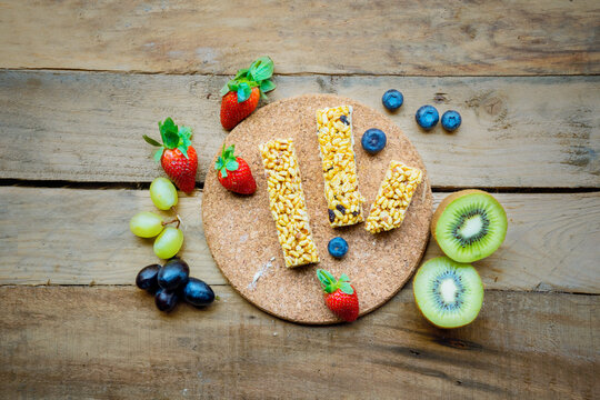 Top Down View Of Cereal Granola Bars With Fruits