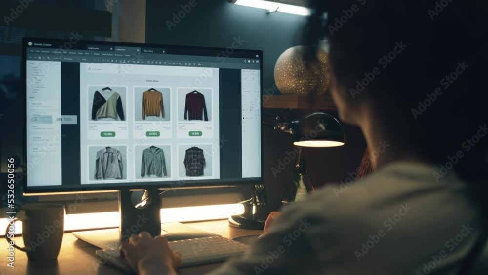 Poster Male web designer using personal computer for creating website in professional constructor while working on project remotely at home. Freelance