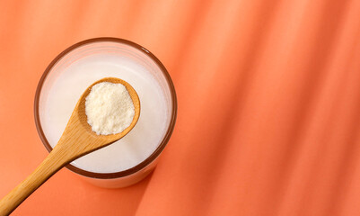 Powdered milk mix in the glass with water