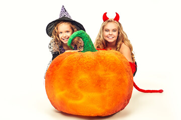 children with large pumpkin