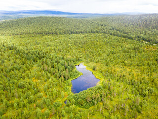 Artificial pond made to look like the Finnish map in Lapland, Finland