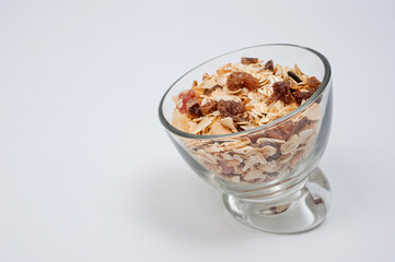 Muesli from oatmeal fruits and nuts, healthy diet food.