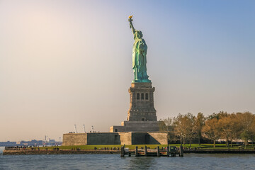 Statue of Liberty and clear sky at sunset, New York City, United States