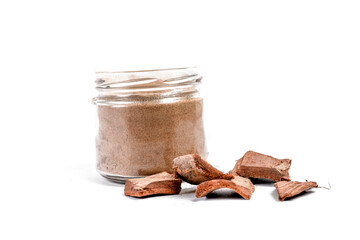 Dry arjun chal powder or Terminalia arjuna ayurvedic herb on white background