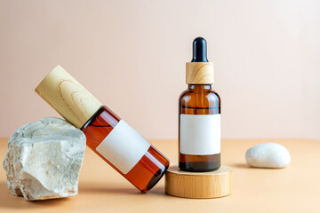 SPA natural organic cosmetics packaging design. Set of transparent dark glass bottles with face serum and essence.